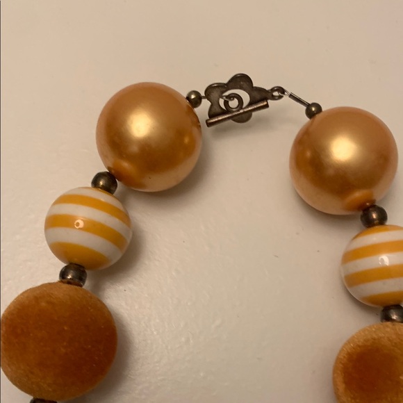 Gold and Orange Bohemian Necklace with Decorative Charm - Picture 6 of 7